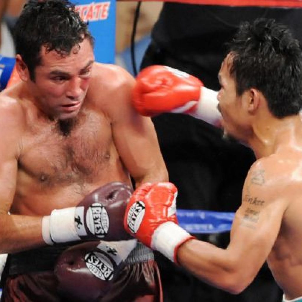 Óscar de la Hoya recibe golpe de Manny "PacMan" Pacquiao  en su pelea de  diciembre del 2008 